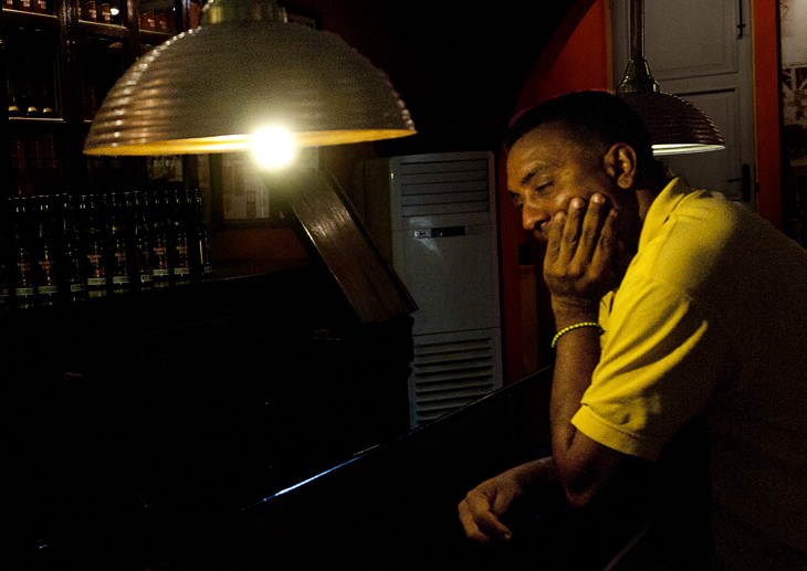 2011-12-02 - Havana Daytime - Havana Rum - Man in Bar Looking Sanguine