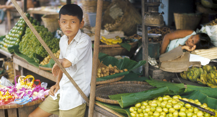 1972 - Thailand - Young Boy In Market with Sleeping Woman