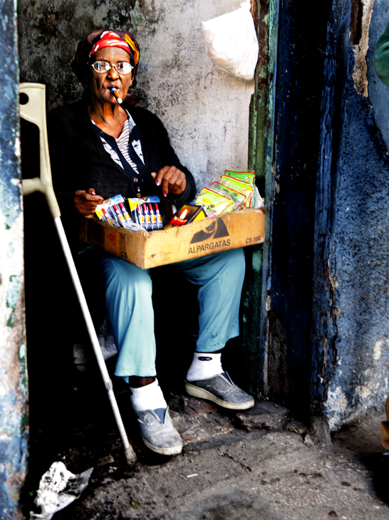 2011-12-01 - Havana Day - Woman Vendor in Doorway Smoking Cigar