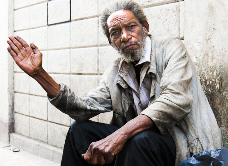 2011-12-04 - Havana Morning  - Man Sitting on Sidewalk - Defending Self